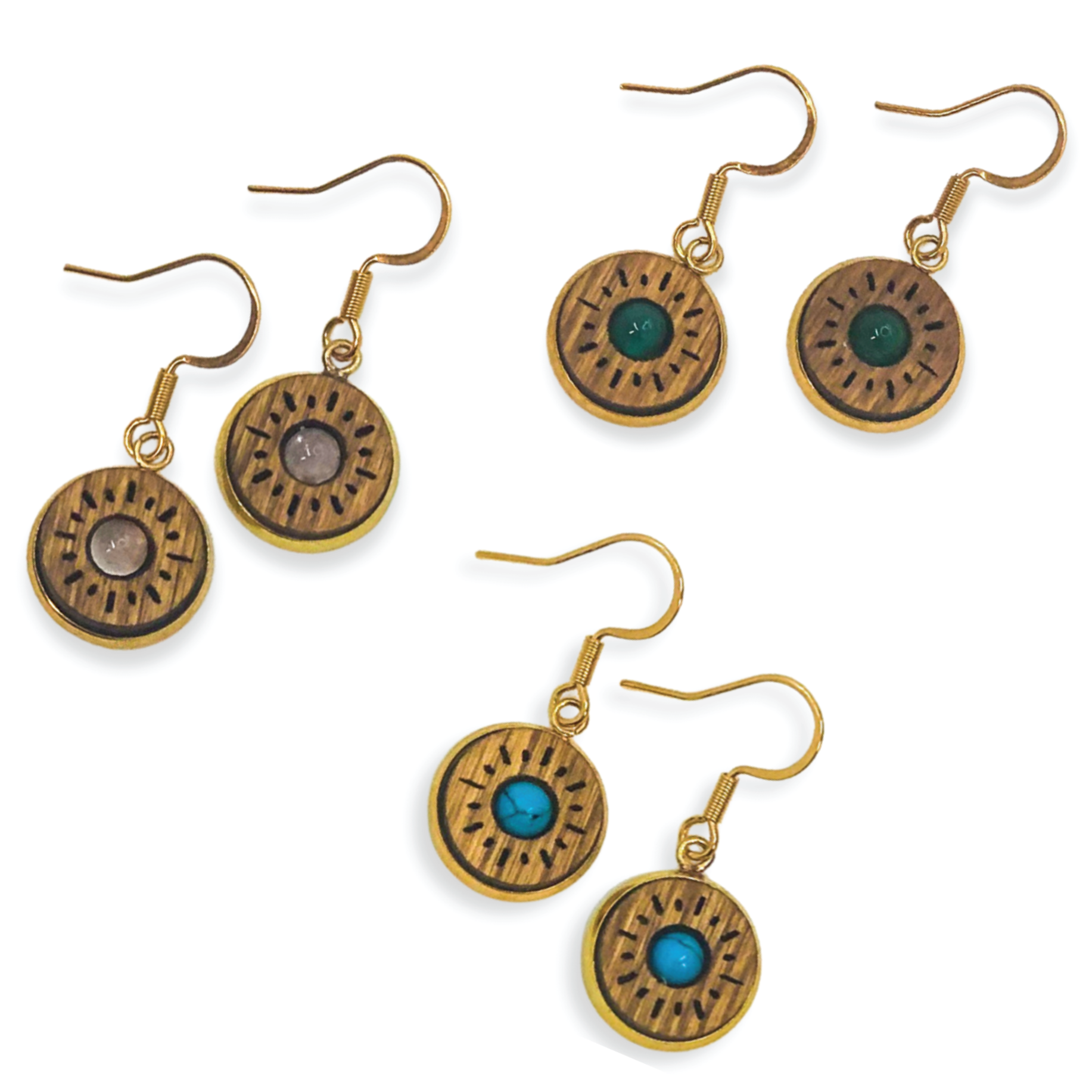 Pair of wooden earrings with circular designs and turquoise stones on a white background
