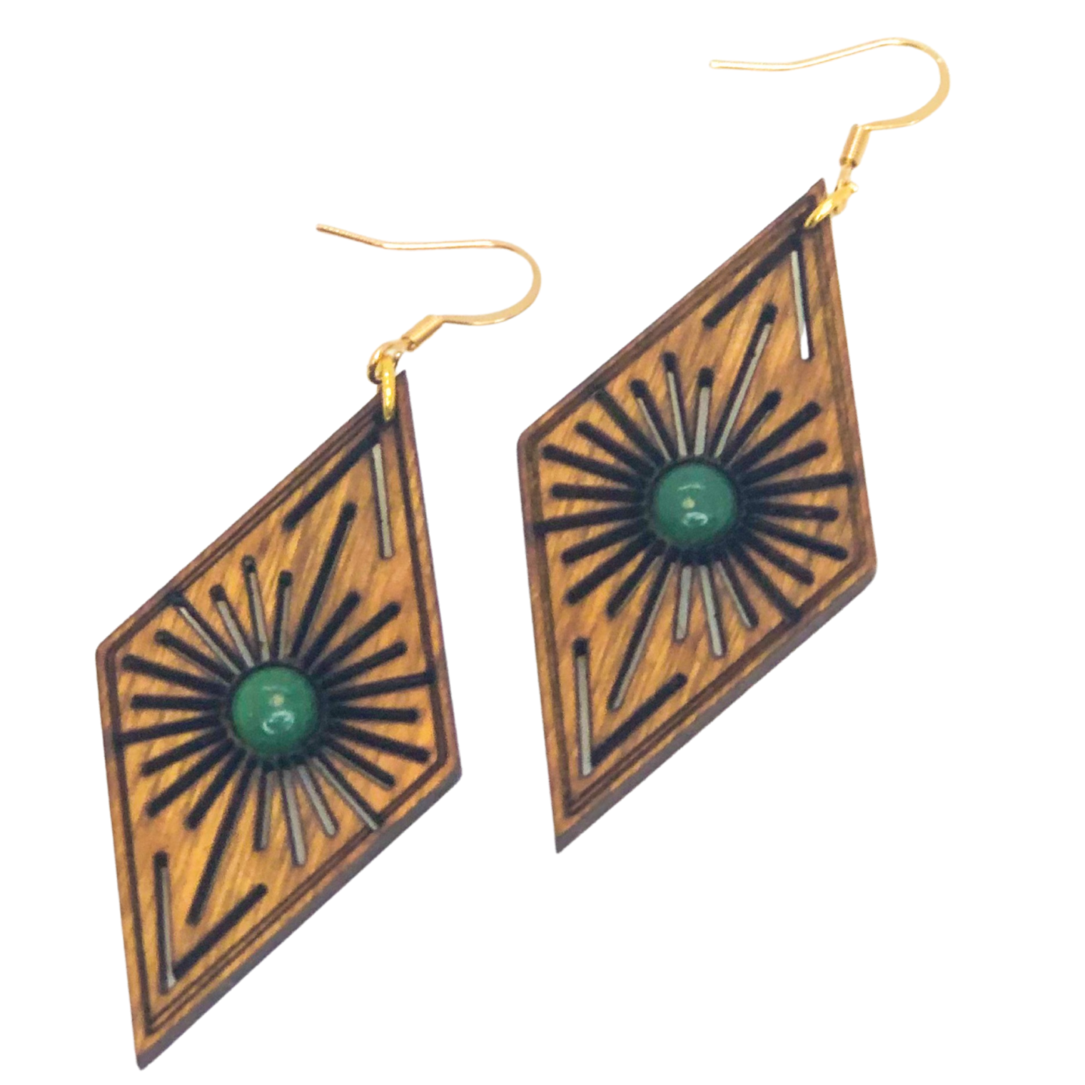 Wooden earrings with geometric design and green gemstones on a white background