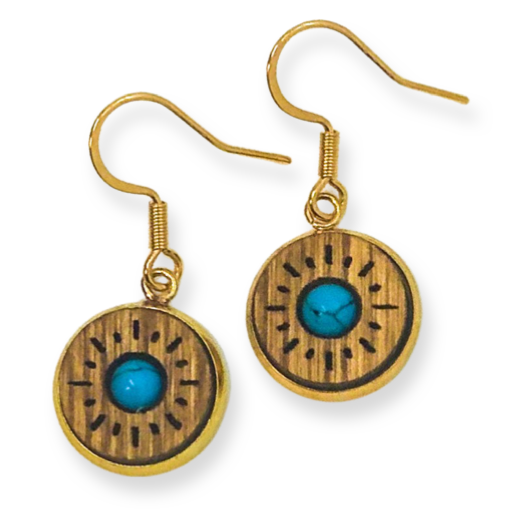 Pair of earrings with wooden and gold design on a white background
