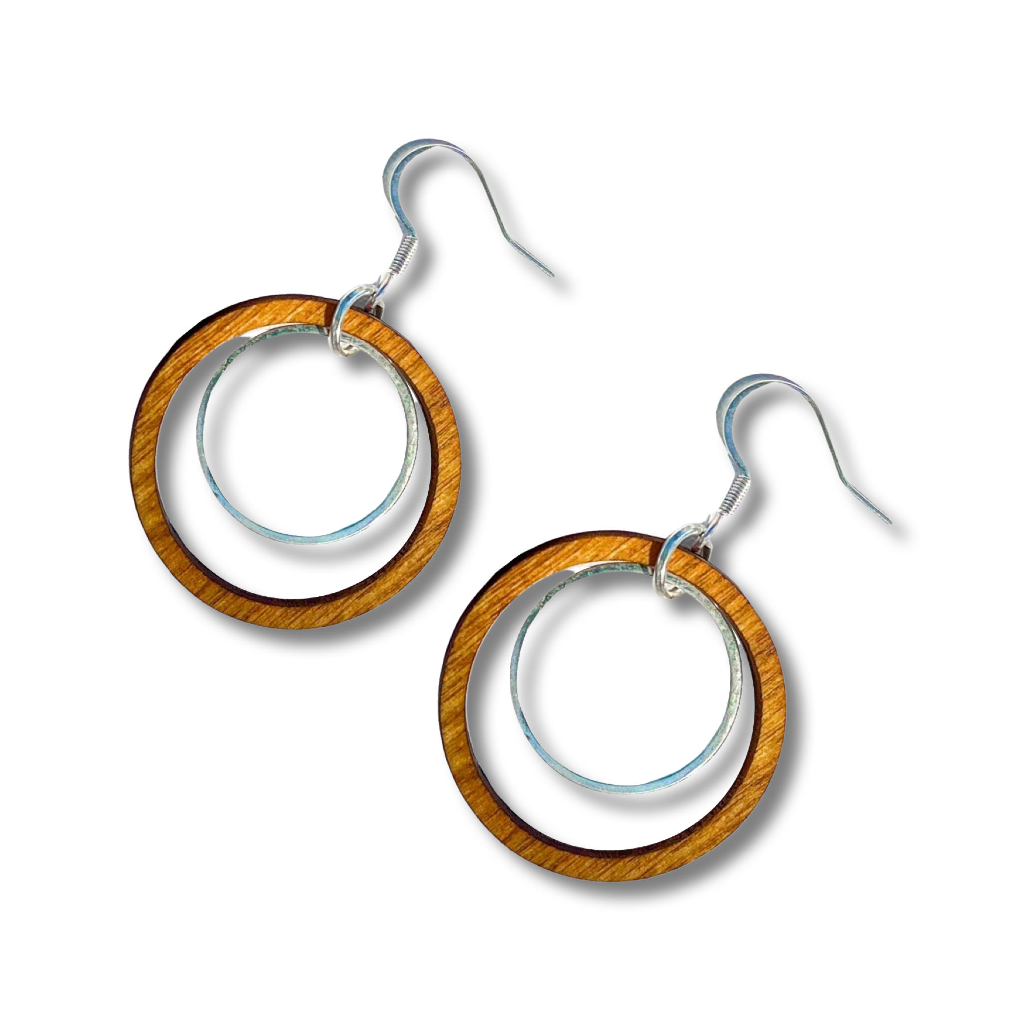 Pair of wooden hoop earrings with a steel ring in the center of the loop.