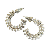 Silver hoop ear rings with a vine design.