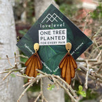 Wooden drop earrings with wooden art-deco arches dropping from a gold stud.