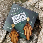 Wooden drop earrings with wooden art-deco arches dropping from a gold stud.